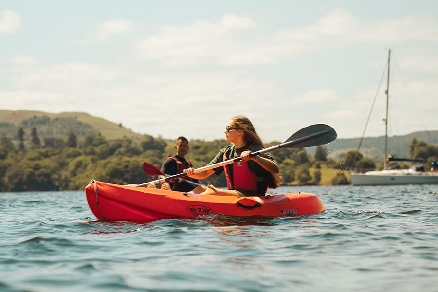 Paddlesport Race Woman kayaing
